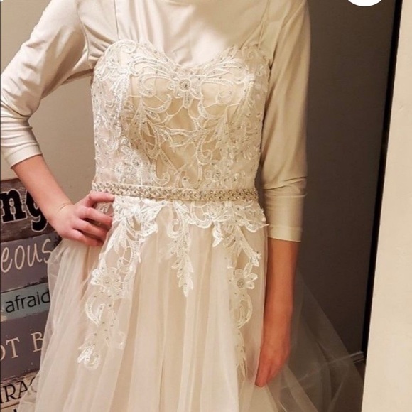 Beautiful sheer white with hints of pink prom dress never worn. Size 4 - Picture 14 of 15